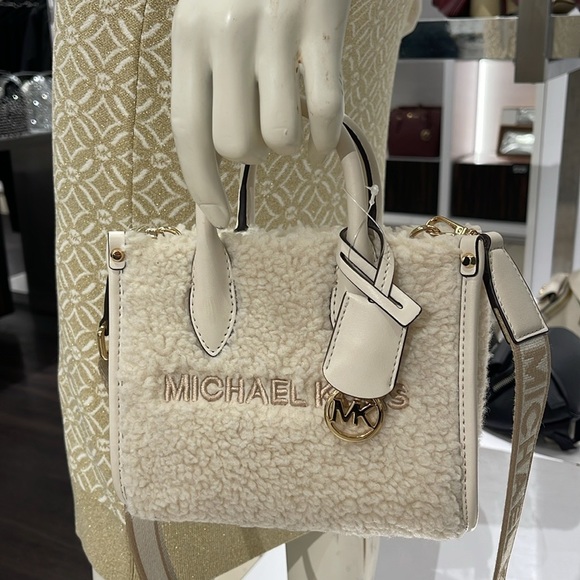 Michael Kors Mirella Extra-Small Sherpa XS SHOPPER XBODY
SHEARLING Crossbody TZ - Picture 4 of 16